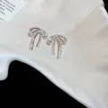 Elegant silver needle bow stud earrings with intricate lace-edge detailing for women - Hollow Lace Style (5#)