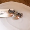 Elegant retro bow knot earrings with pink pearl charms for women, chic and refined jewelry - Retro Pearl Style (17#)