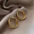 Elegant multi-layered gold geometric hoop earrings with a polished metallic finish - Twisted Hoop Style (HE4762)
