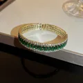 Elegant retro gold open bangle with emerald green baguette zircons and white crystals - Rectangular Open Cuff Bracelet / Green