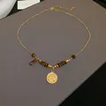 Elegant gold necklace featuring irregular tiger eye beads and a round Libra zodiac pendant - Libra Splicing Style (23#)
