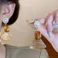Elegantes pendientes geométricos colgantes con perla y estampado de leopardo para mujer - Estilo Geométrico de Colgante en Forma de Abanico (42#) / Leopardo Café Arena Movediza