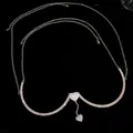 Elegant detail showing the sparkling silver rhinestone heart charms on a body chest chain - Heart Style / Silver