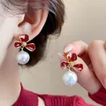 Detail view of elegant red flower pearl earrings for Chinese New Year celebrations. - Red Flower Pearl Drop (6#) / Red & Gold