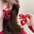 Festive red beaded bow earrings with heart pendant for Lunar New Year and special events - Bowknot Heart Drop (35#) / Red