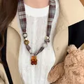 Chic plaid fabric strap necklace featuring a cute brown acrylic bear pendant accessory - Necklace Style 33 / Brown Bear
