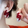 Elegant red velvet Double C stud earrings with large white pearls for Chinese New Year style. - Double C Flocked Pearl Style (20#) / Red & White