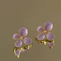 Close-up of purple flower earrings with pearl center and golden oil-drop texture. - Silver Earring Post Style / Purple-Gold