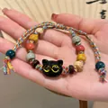 Handmade ethnic style beaded bracelet with a cute black cat charm and colorful woven cord. - 1 Piece / Multicolor Style (65#)
