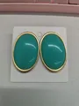 Vintage oval turquoise resin earrings with elegant gold-tone metal frame - Gold-Blue