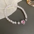Elegant pearl bracelet featuring a sparkling pink heart crystal and silver accents - Sweet Pearl Splicing Bracelet / Heart Pearl