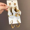 Set di tre orecchini eleganti con pendenti in resina marmorizzata e cerchi geometrici dorati - 15# Oro Perno d'argento
