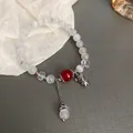 Elegant New Chinese style white glass bead bracelet featuring red bead and pig charm - New Chinese Antique Bracelet / Bear Round Bead