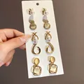 Dettaglio di set orecchini vintage con perle e pietre occhio di gatto - 12# Ago d'Argento - Oro