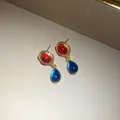 Vintage-style gold drop earrings featuring red round and blue teardrop cabochons. - Earrings (Silver Earring Post)(29#) / Gold-Red-Blue