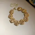 Elegant vintage golden rose flower bracelet featuring sparkling rhinestone centers for women - Bracelet (31#) / Gold