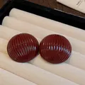 Macro detail of burgundy striped half-round metal stud earrings with silver needles - Semi-Circular Stud (HE18454) / Red - Striped