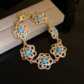 Elegant vintage gold flower bracelet featuring turquoise beads and sparkling rhinestones - Bracelet (34#) / 1 Piece / Gold-Blue