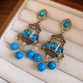 Vintage chandelier earrings with blue stones and gold drop tassels in jewelry box. - Silver Needle Style (78#)