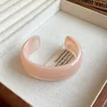Minimalist resin open cuff bracelet with elegant pink marble swirl pattern for women - Style 57