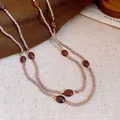 Elegante collana di perline marroni con pietre ovali rosso-marroni e accenti dorati - Stile 31 / Grigio