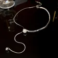 Elegant Y-shaped necklace featuring silver-tone textured beads and a central pearl accent - Y-Shaped Choker Style (HN2148) / Silver