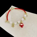 Bracelet en fil rouge plaqué or avec breloque serpent mignonne et perles blanches pour l'année du serpent - Style de Collage Oeil de Chat Imitation Serpent Dessin Animé (16#) / 16# Bracelet Rouge