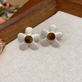 Elegant matte silver flower stud earrings featuring a retro brown stone center design - Five-Petal Flower Shape Style (WE5304) / Silver and Coffee