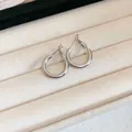 Minimalist silver round hoop earrings on beige velvet jewelry display tray - Style(56#) / 20mm / Silver