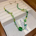 Sweet forest style beaded necklace with green dopamine-inspired accents and heart charm - Green Transparent Beads