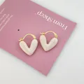 Vintage marbled heart hoop earrings with gold-toned finish and silver needles - White Heart Huggie