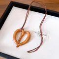 Vintage heart-shaped wooden pendant necklace with brown cord, Zen style sweater chain. - Necklace #71 - Brown - Heart
