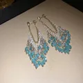 Elegant silver needle chandelier earrings with light blue glass teardrop beads and gold fringe - Streaming Flower Tassel (34# 925 Sterling Silver Earring Post) / White-Blue