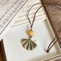 Handmade vintage bronze ginkgo leaf pendant necklace with a natural wooden bead accent - 16# Ginkgo Leaf / Bronze