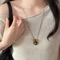 Vintage style beaded long necklace featuring a heart-shaped tiger eye stone pendant - 19# Necklace-Silver-Brown