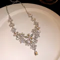 Elegant vintage flower necklace with sparkling rhinestones in a luxury palace style design - Necklace / Silver