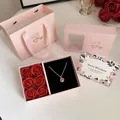 Pink jewelry gift box set with six red soap roses and a flower pendant necklace - Pink