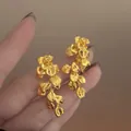 Elegante goldene Blumenohrstecker im französischen Stil mit Vintage-Hammerschlag - 3D Schmetterlingsstil (5#)