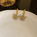 Elegante goldene Schmetterlings-Ohrhänger mit minimalistischem Stecker, französischer Vintage-Stil. - Hohler Schmetterlingsstil (53#)