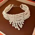 Macro view of five-layer pearl beaded fringe necklace with elegant vintage palace design - Five-Layer Pearl Tassel Style / White-Silver