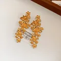 Elegante goldene Blumenohrstecker im französischen Stil mit mattem Metallic-Finish - Großer Blumenstil (66#)