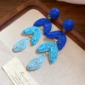 Bohemian blue raffia woven dangle earrings in gradient shades on linen background - Style 28(28#) / Silver Needle / Blue