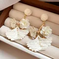 Elegant handmade raffia woven drop earrings with white fabric flower for resort style - Style 20(20#) / Silver Needle / White