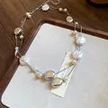 Detail view of French retro double-layer necklace with pearls and silver pebbles. - Necklace / Silver White