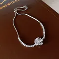 Elegante bracciale tennis regolabile placcato argento con fiore di zirconi scintillanti - Quadrifoglio 19# (HB285-2)