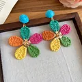 Bohemian style hand-woven raffia multi-color flower dangle earrings in vibrant tones. - Patchwork Multicolor Petal Style (66#) / Silver Needle / Multicolor Blue