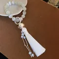 Elegant Chinese style bracelet with white cat eye beads, lotus charm and silk tassel - 12mm Lotus Tassel Style (30#)