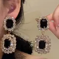 Close-up of luxurious palace style black rectangle stone earrings with sparkling cubic zirconia - Regular Square Style (1#)