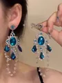 Detailed view of vintage palace style dangling earrings featuring blue crystals and white pearls - Flower Butterfly Tassel Style (2#)