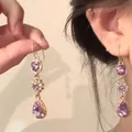 Close-up of elegant purple zirconia teardrop earrings with a vintage palace design - Vertical Pendant Hook Style (6#)